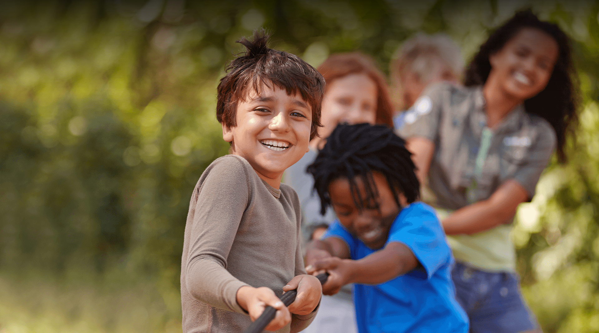 kids pulling a rope